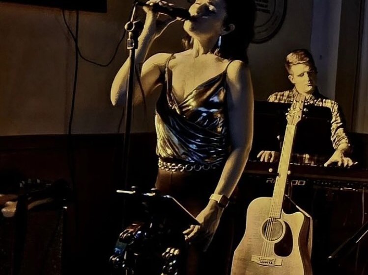 The Embers KC performing